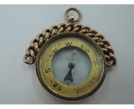A 9ct rose gold compass pendant of traditional form, Chester 1920, GW  approx 8g