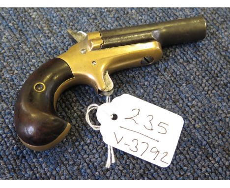 A good Colt Third Model Derringer Calibre (obsolete) .41 Ring fire. Barrel 2.5 engraved 'COLT'. Brass frame. First type hamme