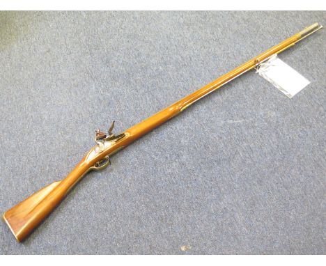 A deactivated Pedersoli copy of a Brown Bess musket. Lock with facsimile Crown/GR, tail dated GRICE 1763. SN:4543 Cal: .75". 