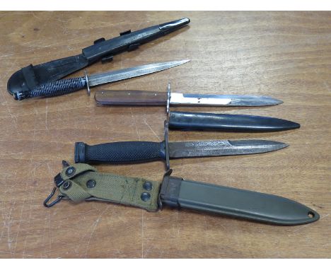 Trench knives including us post WW2 fighting knife, German boot knife and 3rd pattern commando dagger  