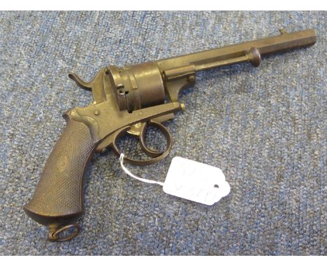 A Belgian 9mm pinfire revolver. Barrel 6 ". Single action. Chequered walnut grip. Belgian proof to cylinder. Dark patina over