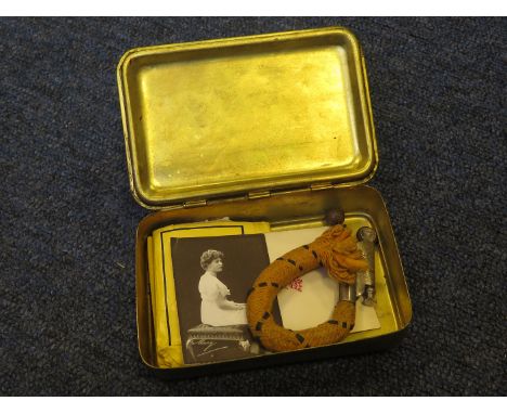 WW1 Princess Mary gift tin with part packet of cigarettes, tinder lighter with 1914 gift card and photo  