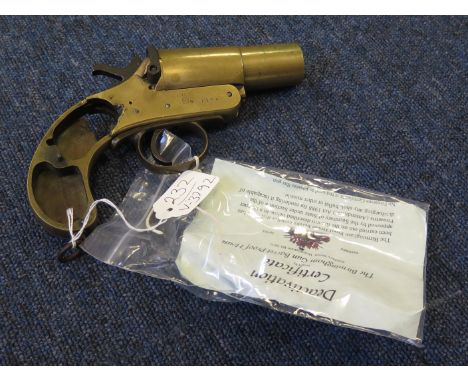An interesting Great War Webley & Scott MK I brass signal pistol. Issue marks for 1915 and WD arrow. Framed marked 'Webley & 