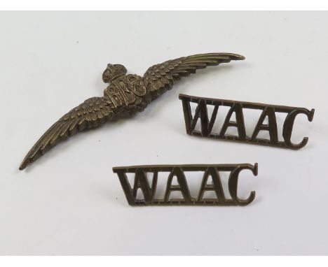 RFC a pair of metal Royal Flying Corps Pilots wings, a pair of WAAC (Womens Aux Army Corps) brass s/titles GVF