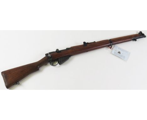 Rifle: A WW1 1918 dated .303 cal SMLE service rifle MKIII* forend. Wood restocked. In very good working order and condition. 