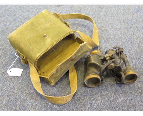 An interesting pair of binoculars in their ME Co case dated 1940 binocular body marked 'Trinity House' and with WD arrow & 'C