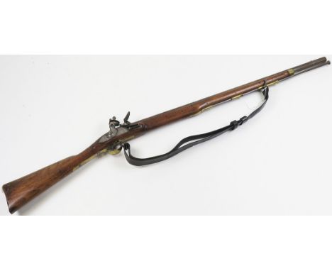 Rifle: A flintlock trade musket for Africa. Part round, part octagonal, barrel 30'' with English proofs. Border engraved, fla