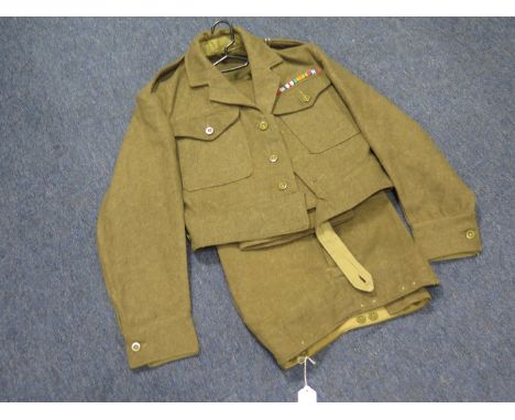 WW2 1940 pattern battle dress blouse and trousers in good condition no moth blouse collars altered for use for officer  