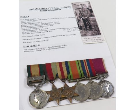 Suffolks group mounted as worn - India General Service Medal GVI with North West Frontier 1937-39 clasp (5822637 Sjt N Gilber