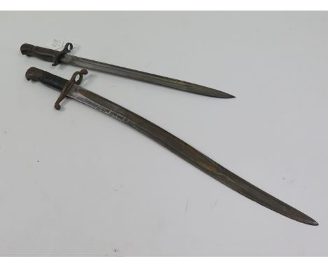 British bayonets: 1) Pattern 1865 Sword bayonet for volunteers. Light rusting. Excellent grips. 2) Pattern 1913 bayonet by Re