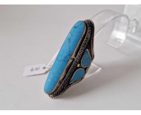 A unusual eastern silver finger ring with turquoise and coral size S