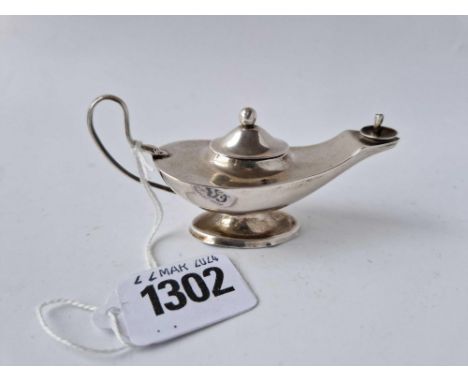 An Aladdin’s Genie Lamp with pull off cover and scroll handle, 3.5 inches long, Birmingham 1908