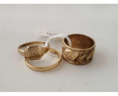 Two gold wedding bands and a signet ring 9 gms Inc.