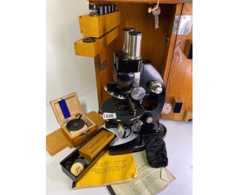 A CARL ZEISS Binocular micro scope in oak case
