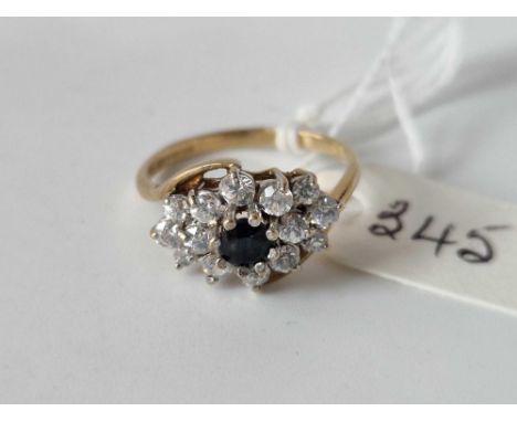 A sapphire cluster ring 9ct size N 2.5 gms