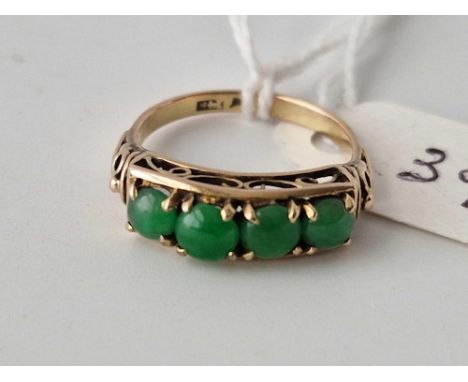 A Chinese jade four stone ring 14ct gold size M 2.4 gms