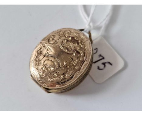 A gold back and front double locket