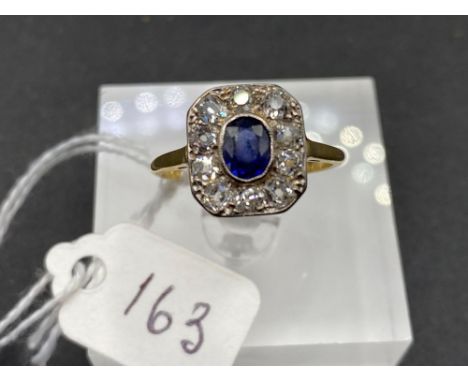 A FINE VINTAGE SAPPHIRE AND DIAMOND DRESS RING THE OVAL SAPPHIRE SURROUNDED BY THICK CUT DIAMONDS 18CT GOLD AND PLATINUM SIZE