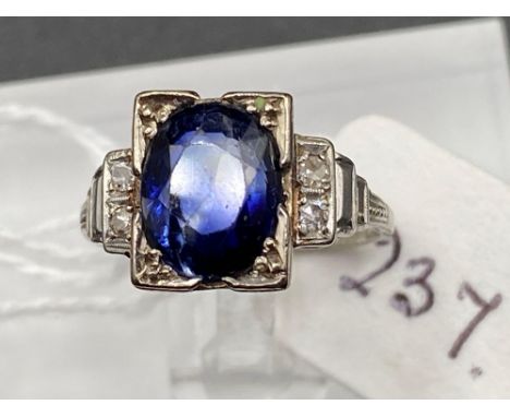 A GOOD QUALITY 1900S OVAL SAPPHIRE AND DIAMOND RING SET IN PLATINUM SIZE J 3 GMS