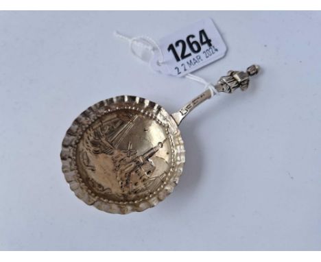 A Dutch caddy spoon with a canal scene