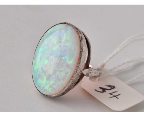 A large silver solitaire opal ring size M 6 gms