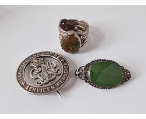 A silver services renders brooch a silver ring and silver green stone brooch 28 gms