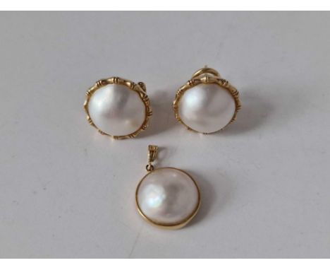 A good Mabe pearl pair of earrings and matching pendant mounted in 14ct gold 8.6g