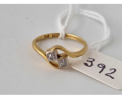 A diamond cross over ring, 18ct, size L, 2.7 g