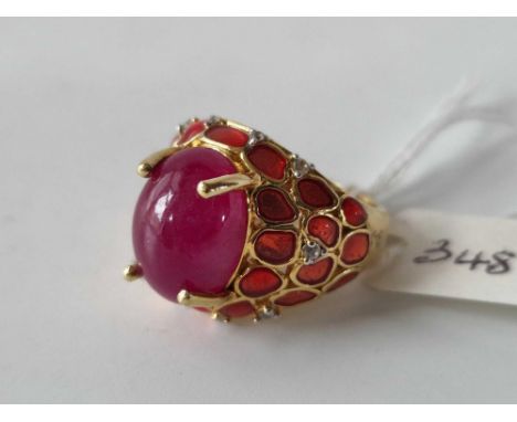 A gold on silver ruby ring size O