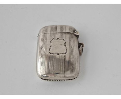 An engine turned vesta case of curved outline, Birmingham 1909 by JG