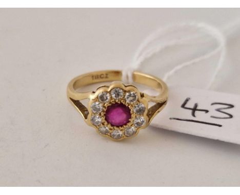 A ruby and diamond cluster ring 18ct gold size I 2.7 g