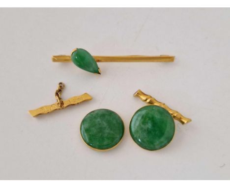 A Chines gold jade bar brooch and pair of cufflinks one damaged