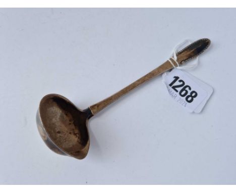 A Georg Jensen pouring ladle with beaded end, 5.5 inches long