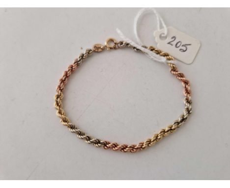 A three coloured gold rope bracelet 9ct 7 inch