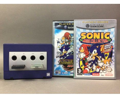 NINTENDO GAMECUBE, PURPLE CONSOLE, CONTROLLER AND GAMES with cables, additional non-branded controller and eleven boxed games