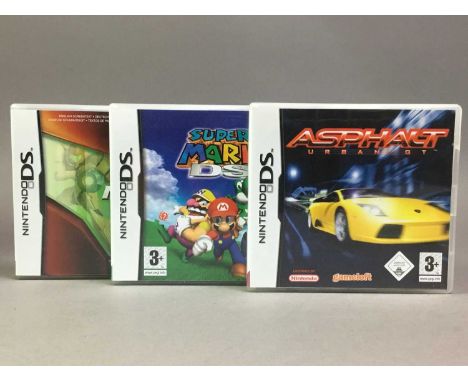 NINTENDO DS CONSOLE AND GAMES original model in silver, together with six boxed games including The Legend of Zelda: Spirit T