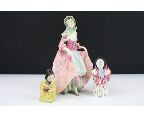 Royal Worcester candle snuffer, modelled as a Japanese lady in a kimono kneeling and eating from a bowl, 7cm high together wi