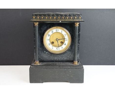 Antique black marble mantel clock with etched decoration and decorative pillar supports,  29cm high x 23cm wide x 16cm deep 