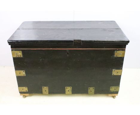 Painted vintage wooden trunk, blanket box with decorative brass hardware corners, fully lined interior, on castor wheels H 54