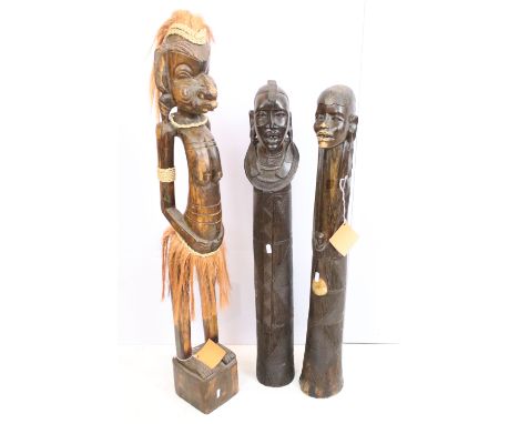Three vintage heavy wood hand carved tribal statues 