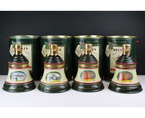 Four Bottles of Bells Old Scotch Whisky Christmas Bells, full contents in original tins, 70cl. Years 1989, 1990 and 1991 x 2 