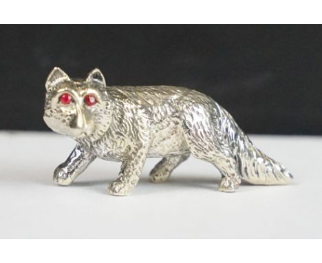 Silver fox figure with ruby eyes 
