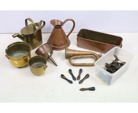 Victorian mixed items to include brass footed planters, watering can, funnel and carpet grips together with copper handled ju