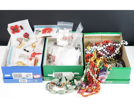 A large collection of vintage and contemporary ladies costume jewellery to include brooches, necklaces and earrings. 