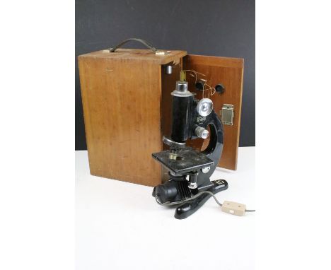 Vintage Beck London electric microscope in wooden carry box with handle dated 1950 