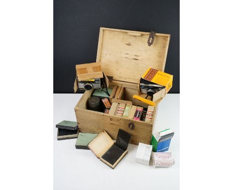 Large quantity of glass negatives of social history interest set within a fitted wooden box, together with a Kodak instamatix