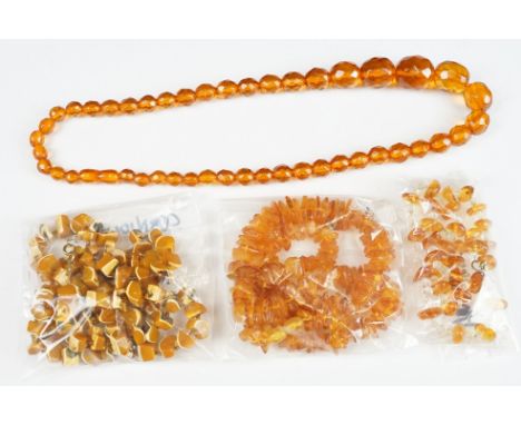 A collection of vintage amber style beaded necklaces. 