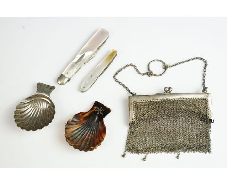 A small group of mixed collectables to include a hallmarked silver and mother of pearl folding pickle fork, silver caddy spoo