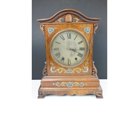 Late 19th century table top shelf cuckoo clock with inlaid ornate detail and cuckoo to centre with hinged removeable back pan