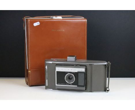 Polaroid Electric Eye Land camera, Model J66 housed in Polaroid brown leather carry case 